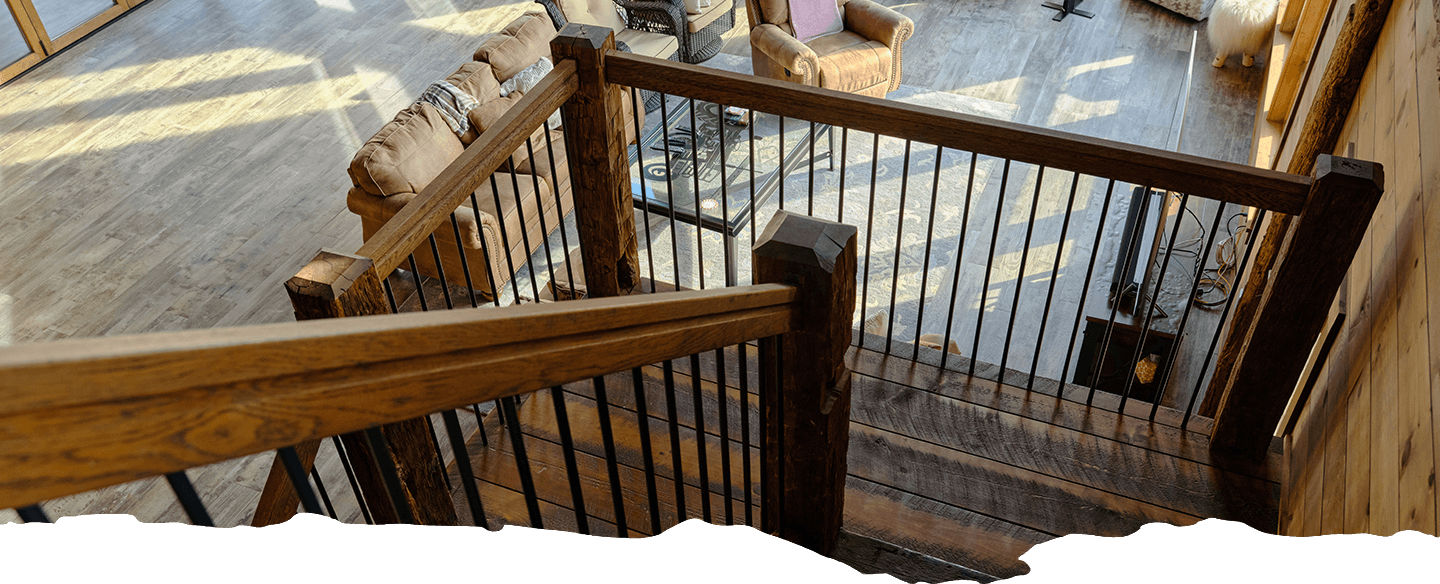 Looking down rustic wood stairway